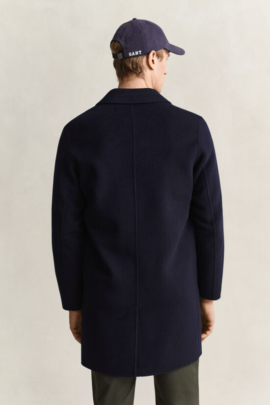 Manteau cousu main
