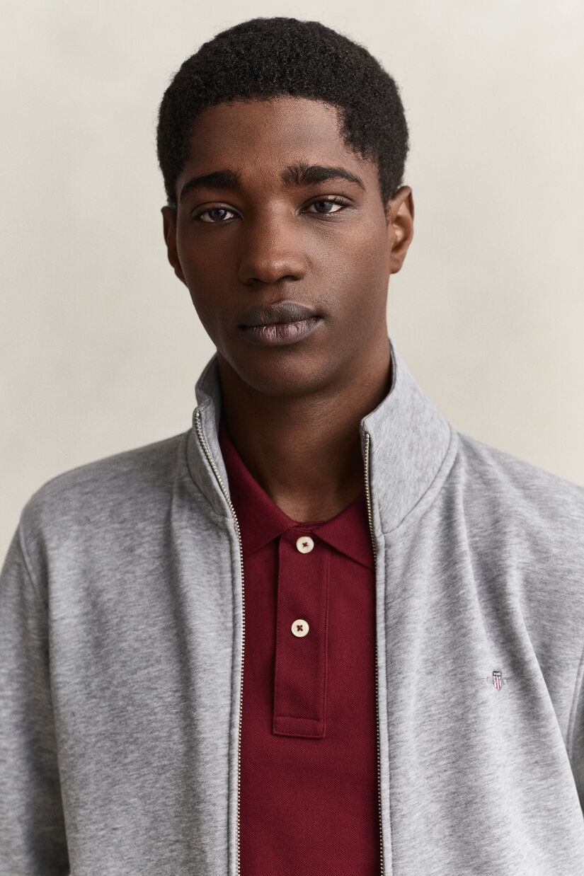 Sweat-shirt zipp&eacute; avec &eacute;cusson