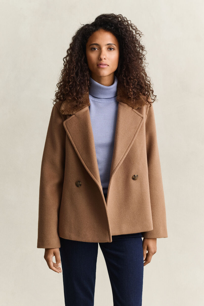 Veste avec col en fourrure synth&eacute;tique