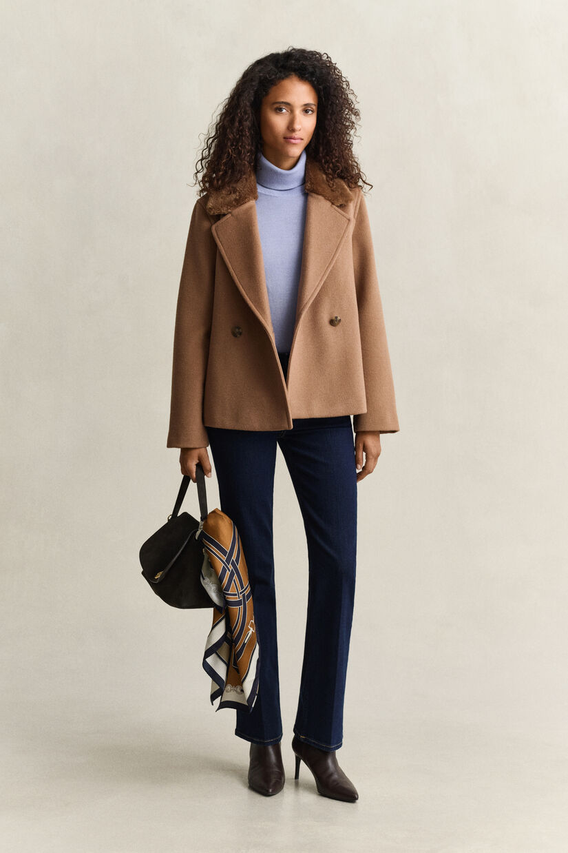 Veste avec col en fourrure synth&eacute;tique