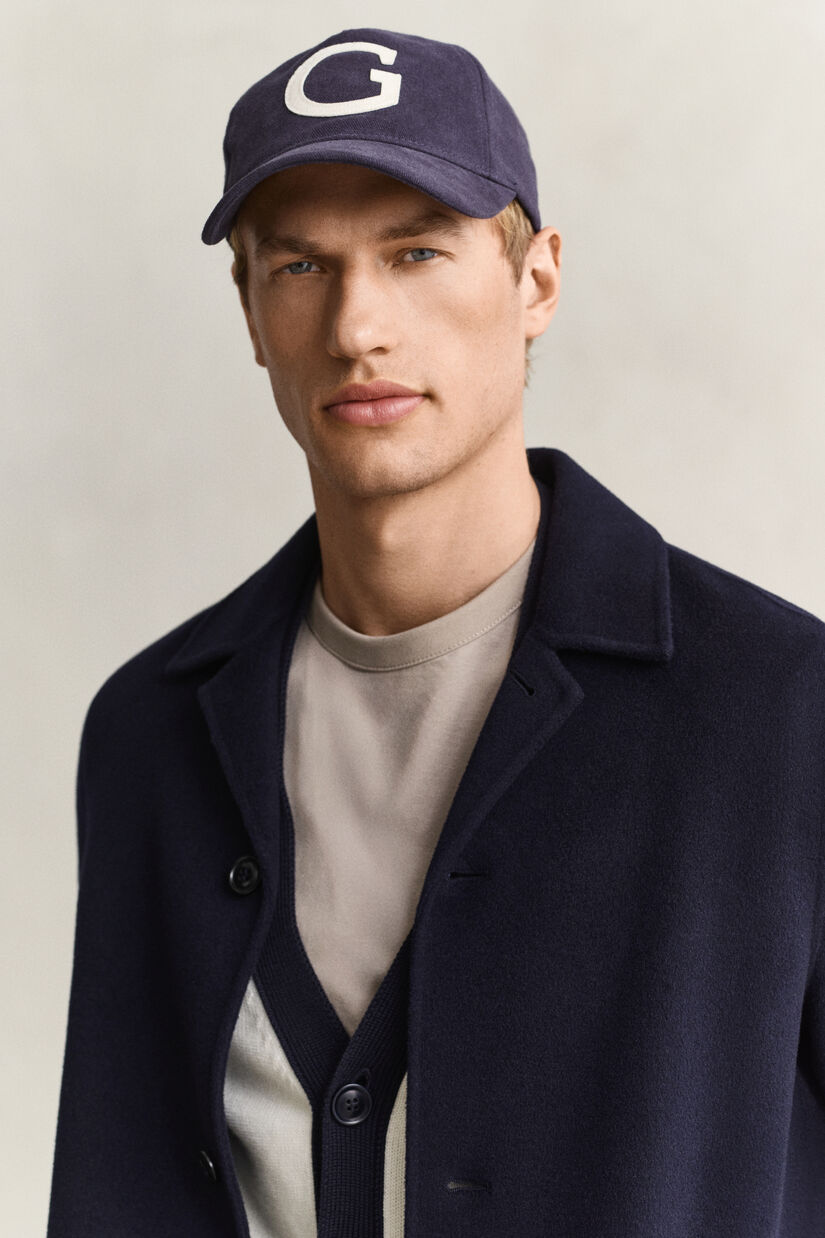Manteau cousu main