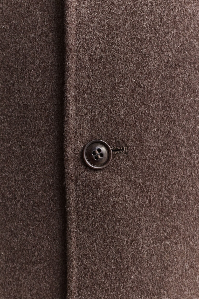 Manteau cousu main