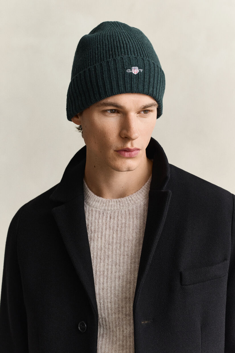 Bonnet en laine avec &eacute;cusson