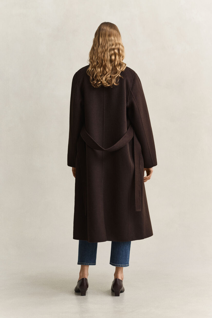 Manteau cousu main avec ceinture