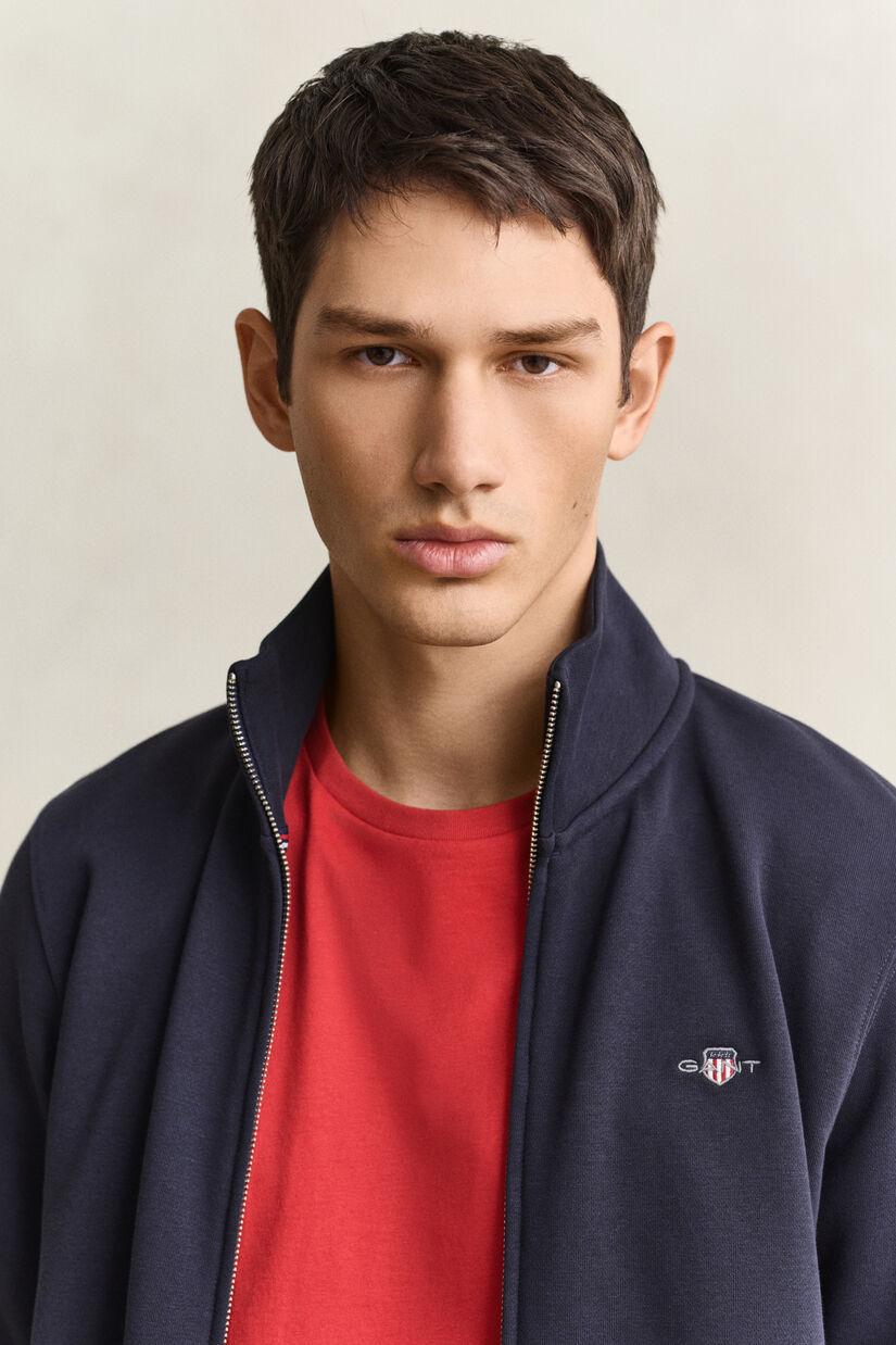 Sweat-shirt zipp&eacute; avec &eacute;cusson