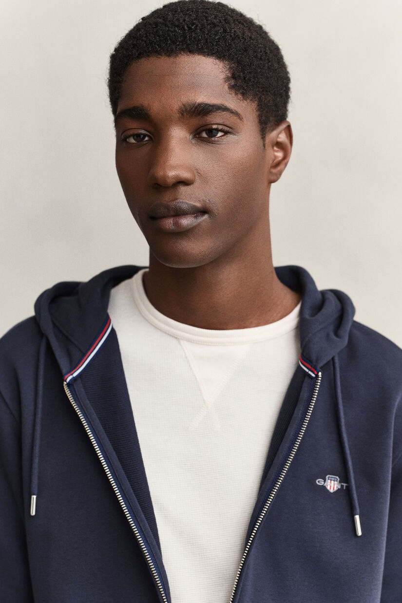 Sweat &agrave; capuche zipp&eacute; avec &eacute;cusson